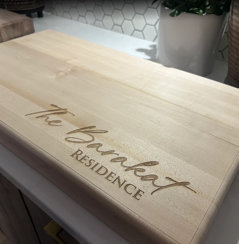 Custom laser engraved wooden Sweeney Residence sign in Ottawa
