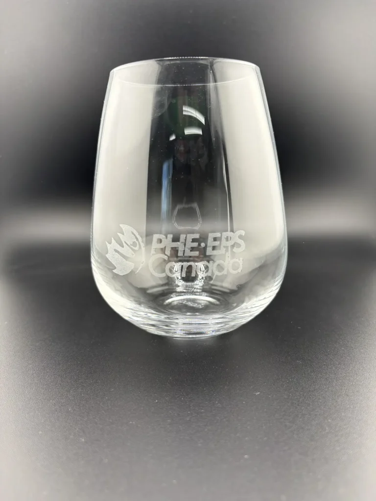 Corporate wine glass engraving with PHE Canada logo in Ottawa