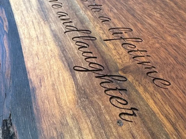 Live edge wood engraving with personalized script message in Ottawa