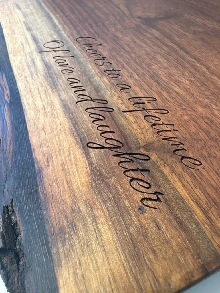 Live edge wood engraving with personalized script message in Ottawa