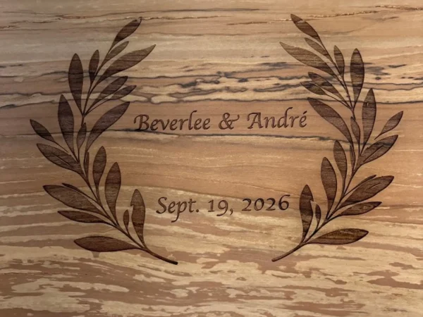 Wedding cutting board engraving with personalized names date and botanical wreath in Ottawa