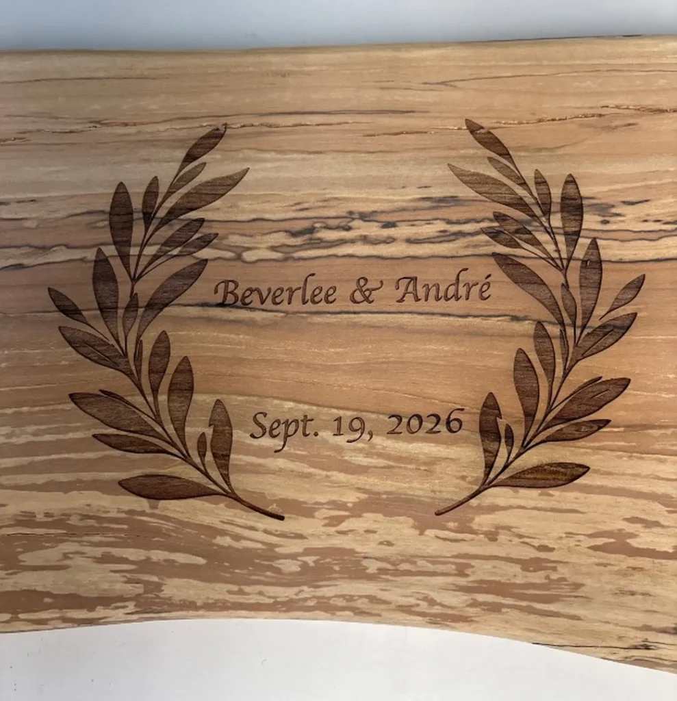 Wedding cutting board engraving with personalized names date and botanical wreath in Ottawa