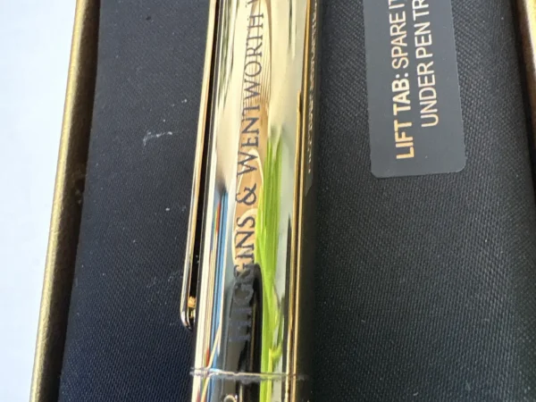 Corporate pen engraving with Gowling WLG branding and personalized name on metal pen in Ottawa