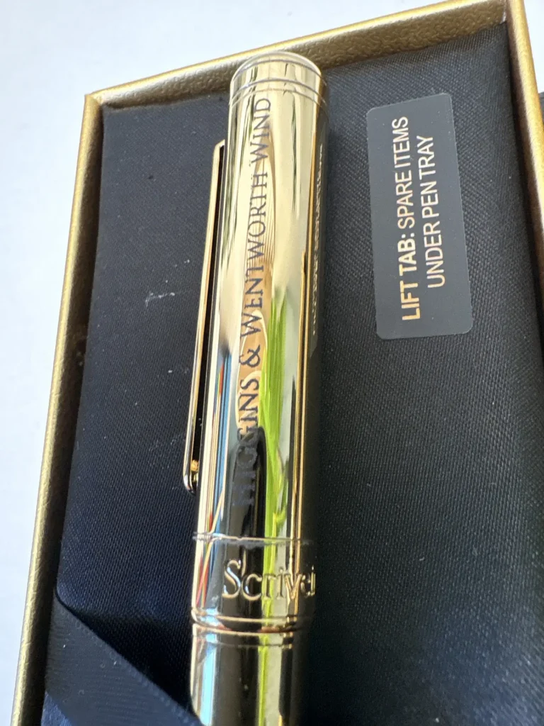 Corporate pen engraving with Gowling WLG branding and personalized name on metal pen in Ottawa